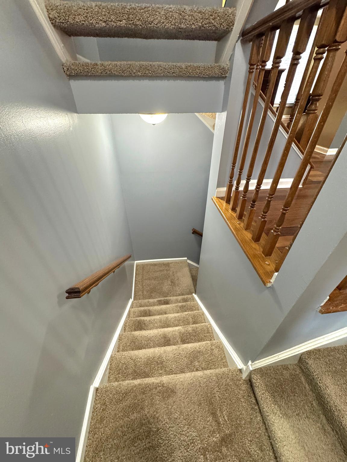2108 Commodore Court Odenton, MD 21113 - Photo 26 of 38 a view of staircase with white walls