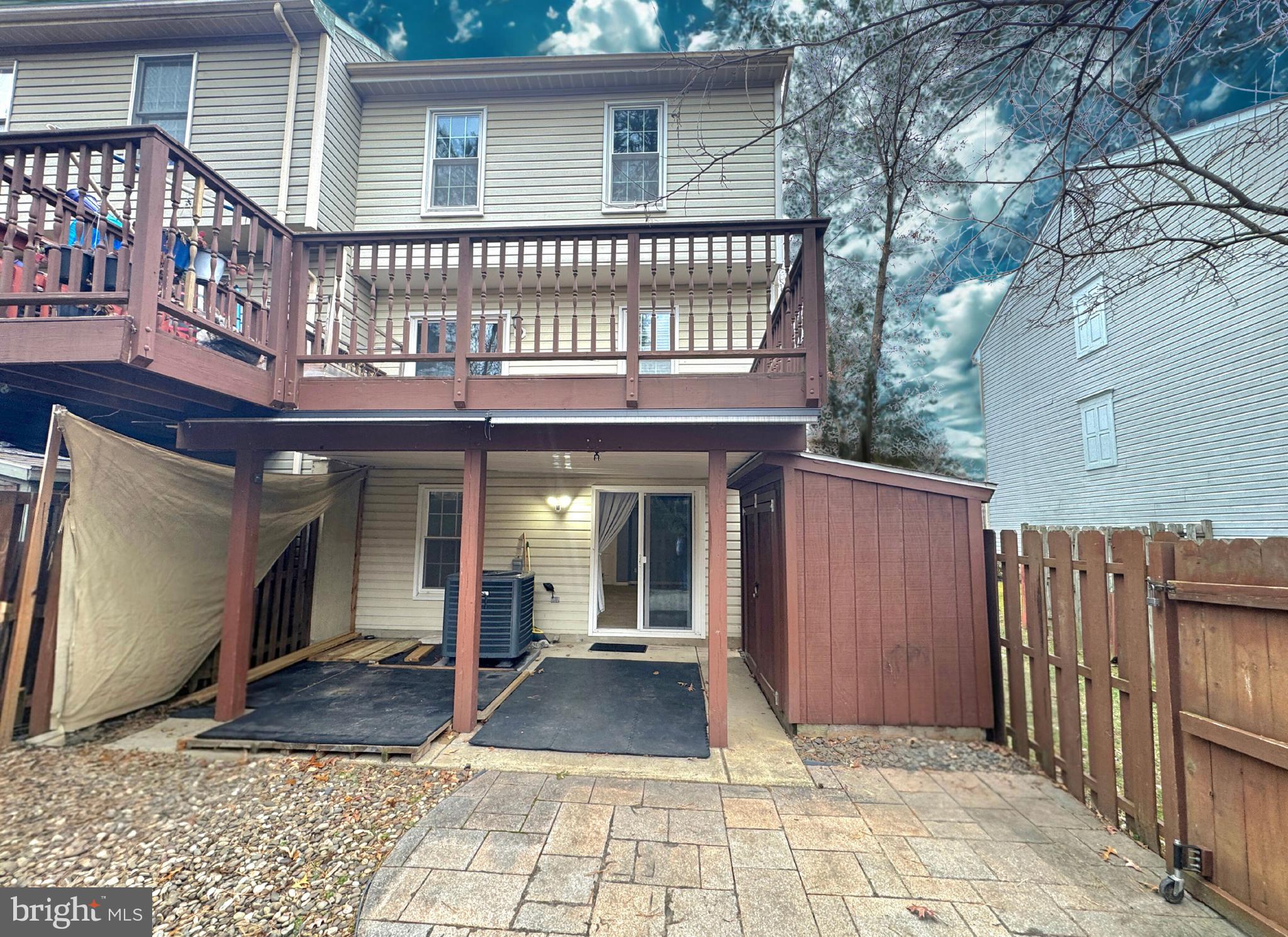 2108 Commodore Court Odenton, MD 21113 - Photo 37 of 38 a view of a house with entrance gate and wooden fence