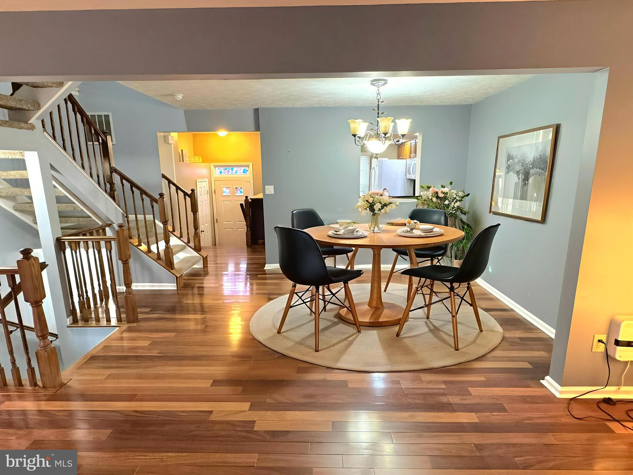 2108 Commodore Court Odenton, MD 21113 - Photo 8 of 38 a view of a dining room with furniture and wooden floor