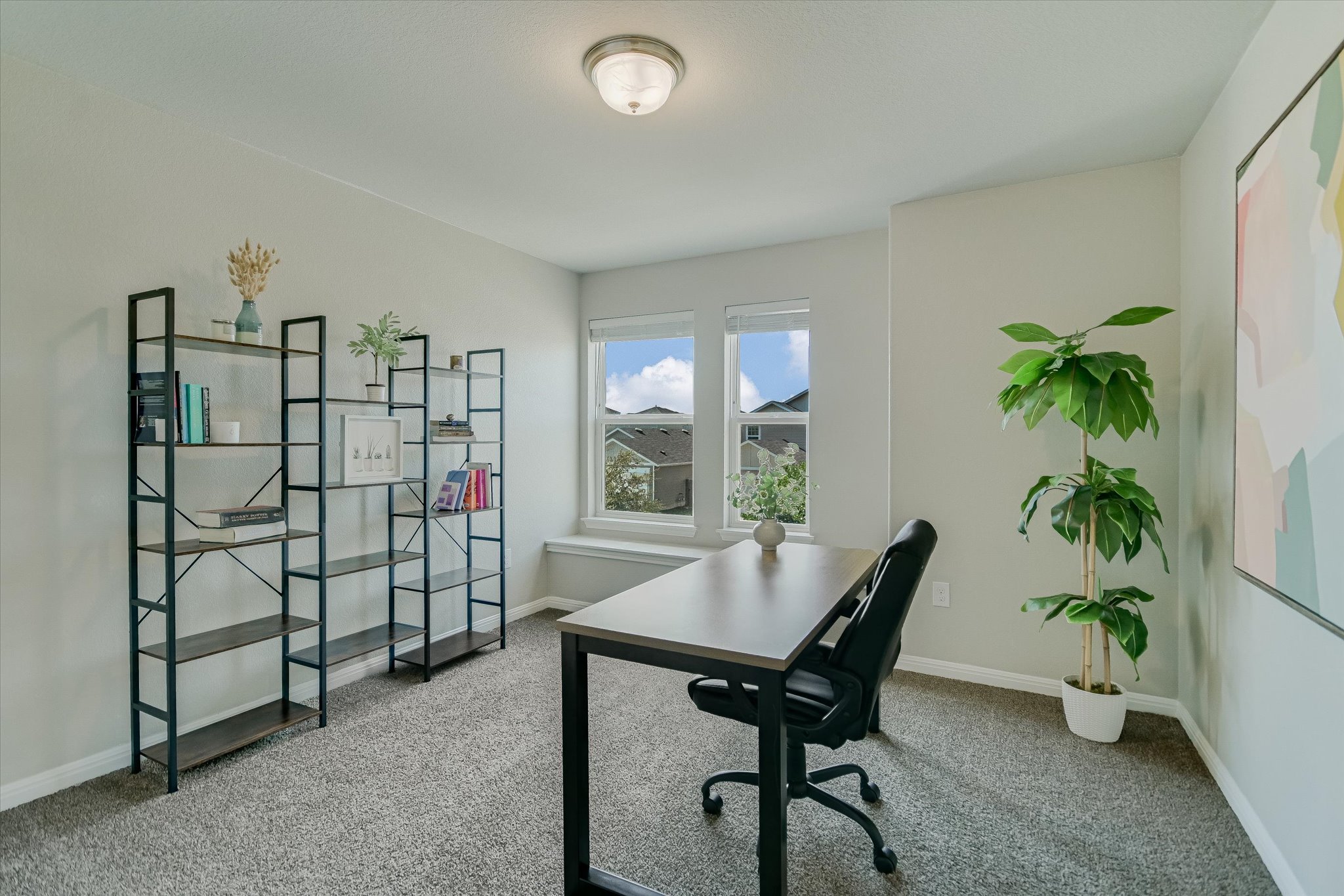 6304 Gunflint Drive Austin, TX 78747 - Photo 15 of 28 Home office, guest room, creative space, this room flexes as your life does.