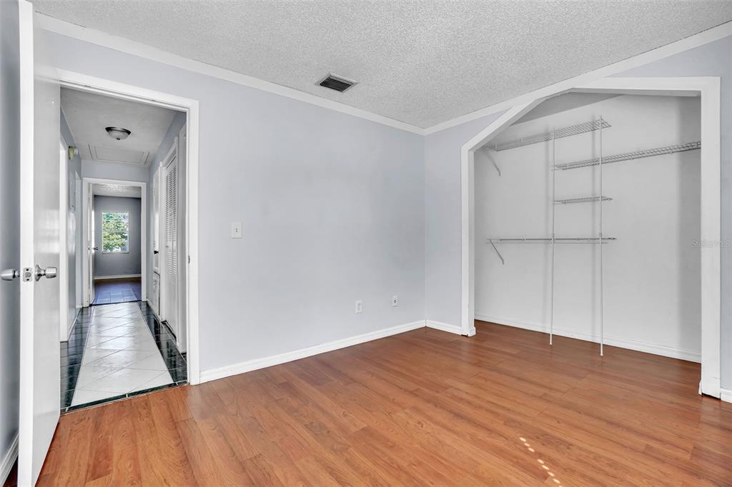 10626 Deergrass Lane Orlando, FL 32821 - Photo 19 of 41 wooden floor in an empty room