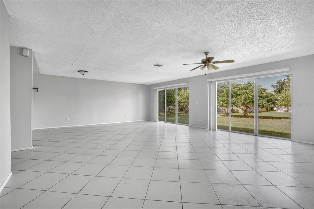 10626 Deergrass Lane Orlando, FL 32821 - Photo 2 of 41 a view of an empty room with a window