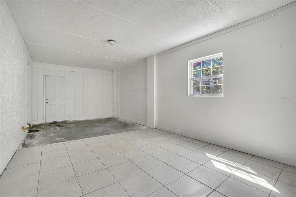 10626 Deergrass Lane Orlando, FL 32821 - Photo 26 of 41 a view of an empty room and window