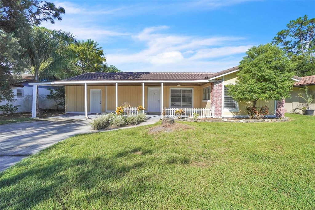 10626 Deergrass Lane Orlando, FL 32821 - Photo 31 of 41 a view of a house with backyard and sitting area