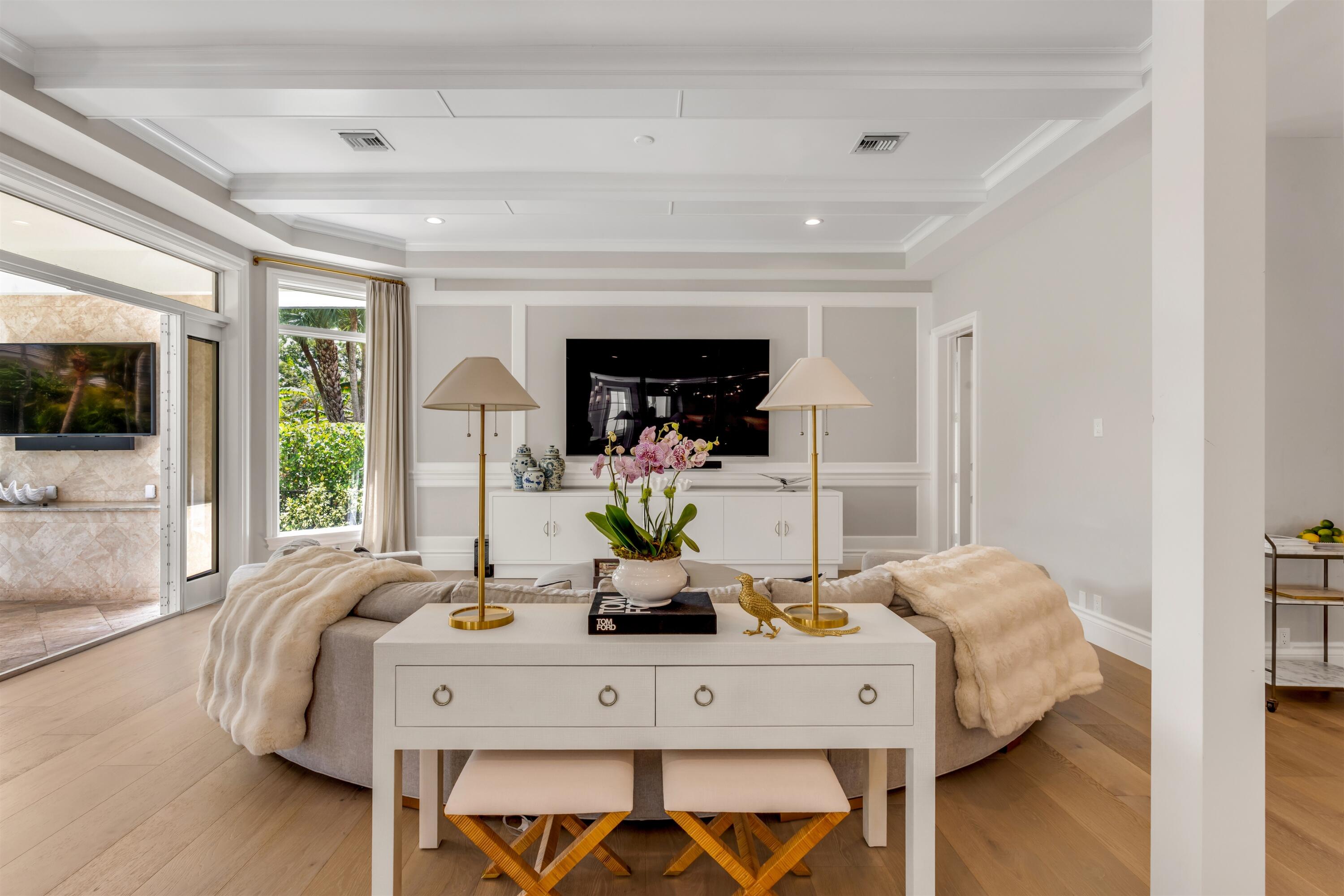 4540 Northwest 24th Avenue Boca Raton, FL 33431 - Photo 13 of 36 a living room with furniture and a fireplace