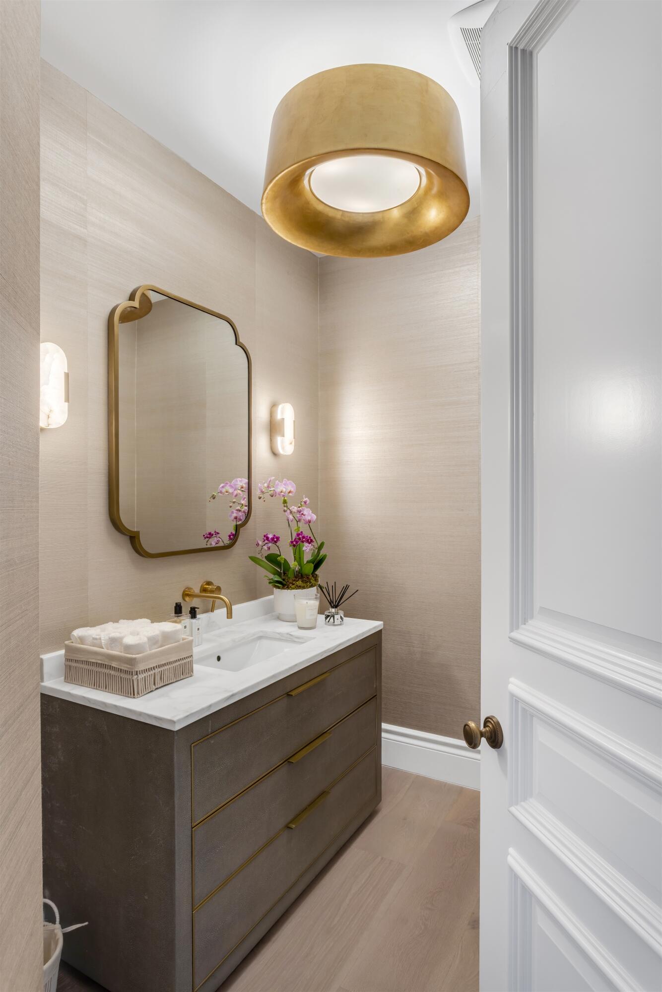 4540 Northwest 24th Avenue Boca Raton, FL 33431 - Photo 16 of 36 a bathroom with a sink and a mirror