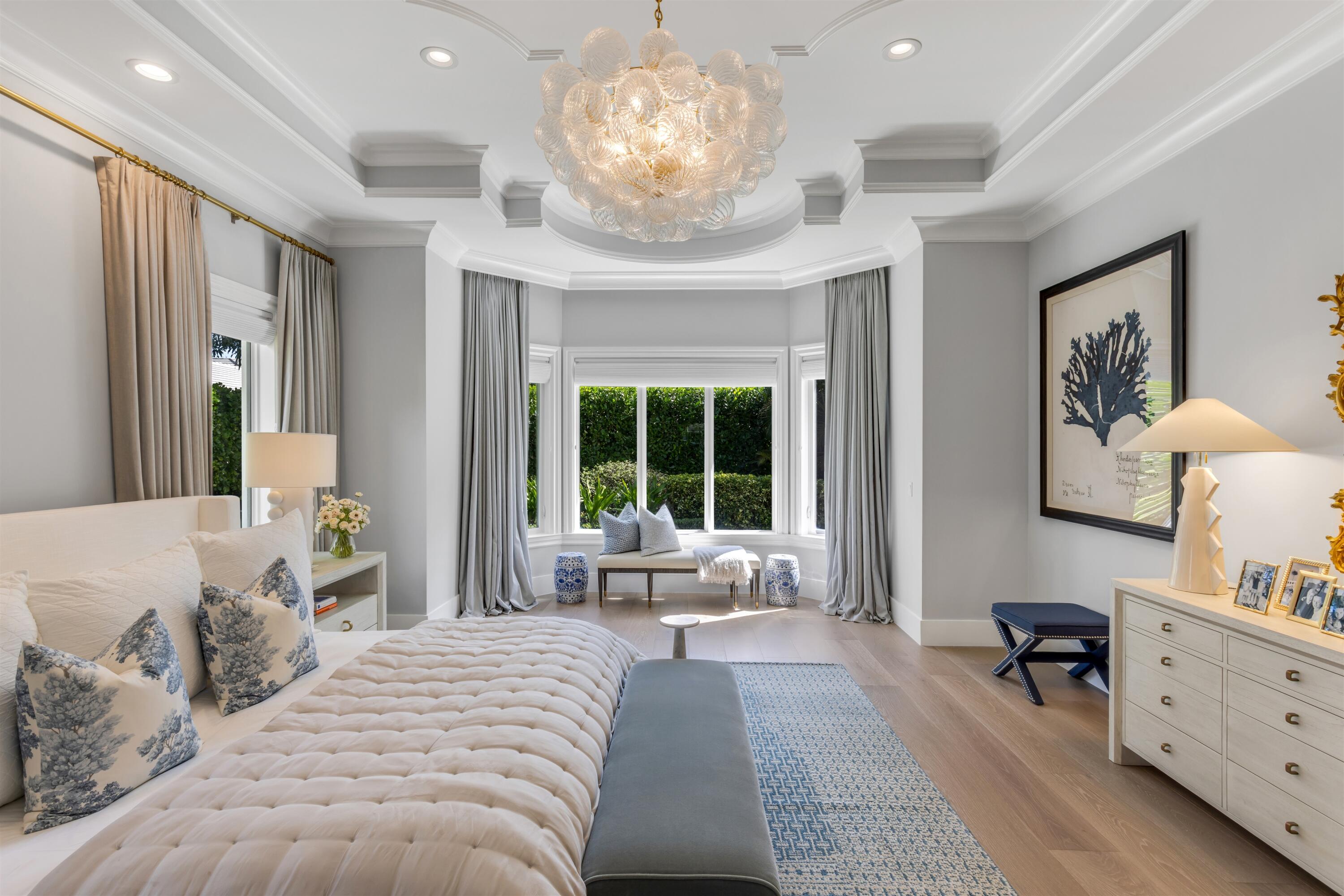 4540 Northwest 24th Avenue Boca Raton, FL 33431 - Photo 18 of 36 a spacious bedroom with a large bed and a window