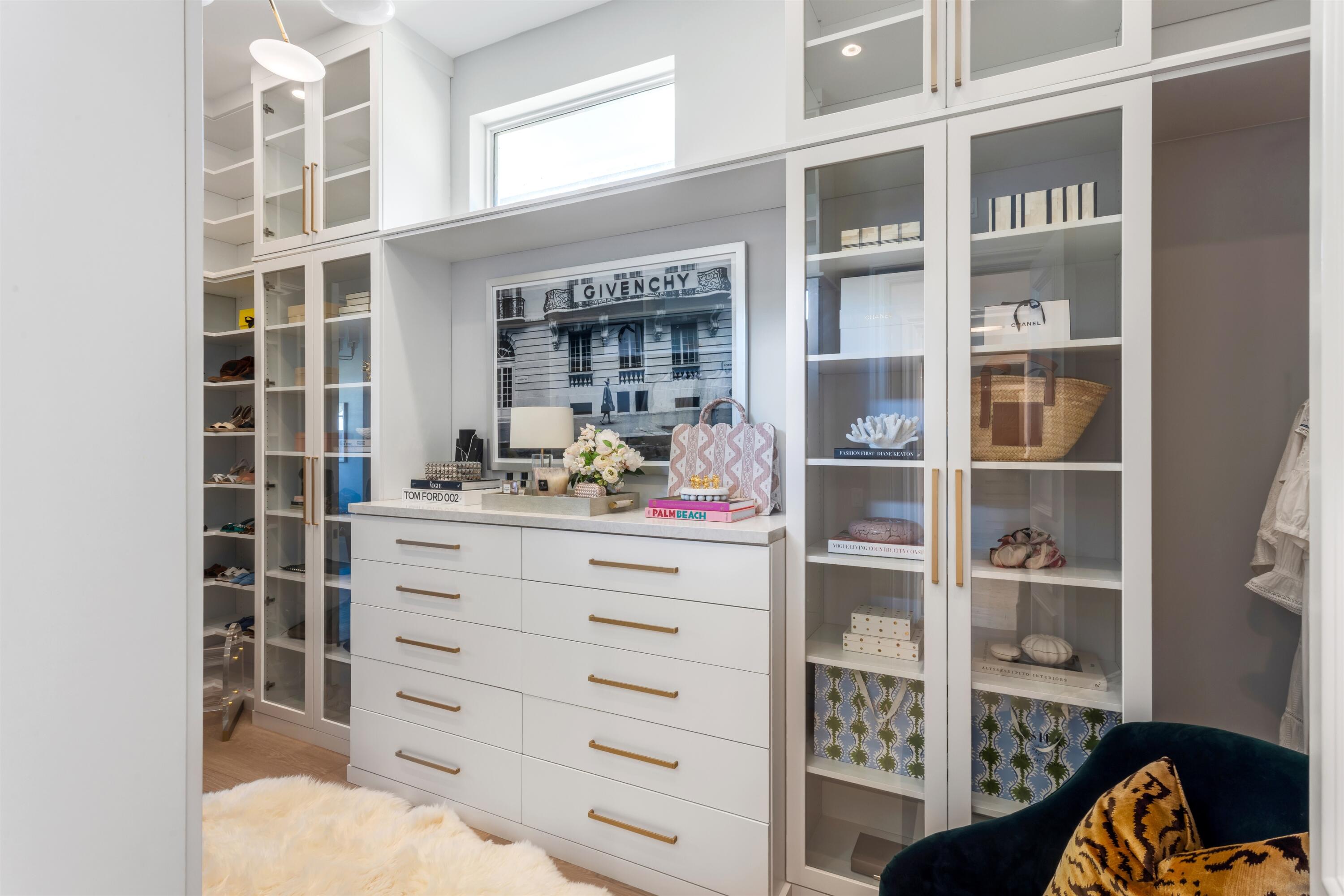 4540 Northwest 24th Avenue Boca Raton, FL 33431 - Photo 19 of 36 a view of bedroom with a closet and cabinet
