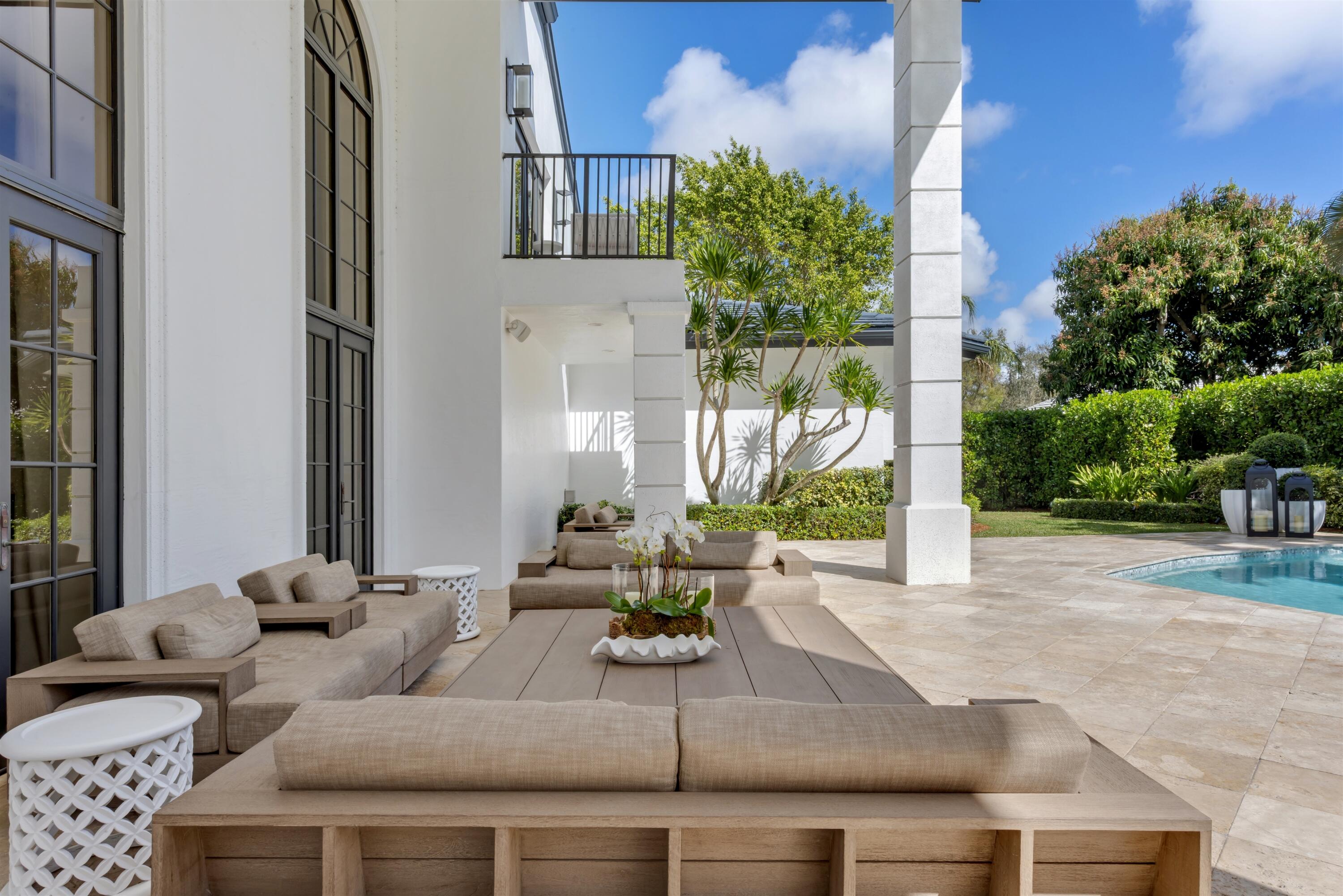 4540 Northwest 24th Avenue Boca Raton, FL 33431 - Photo 26 of 36 a living room with furniture and a large window