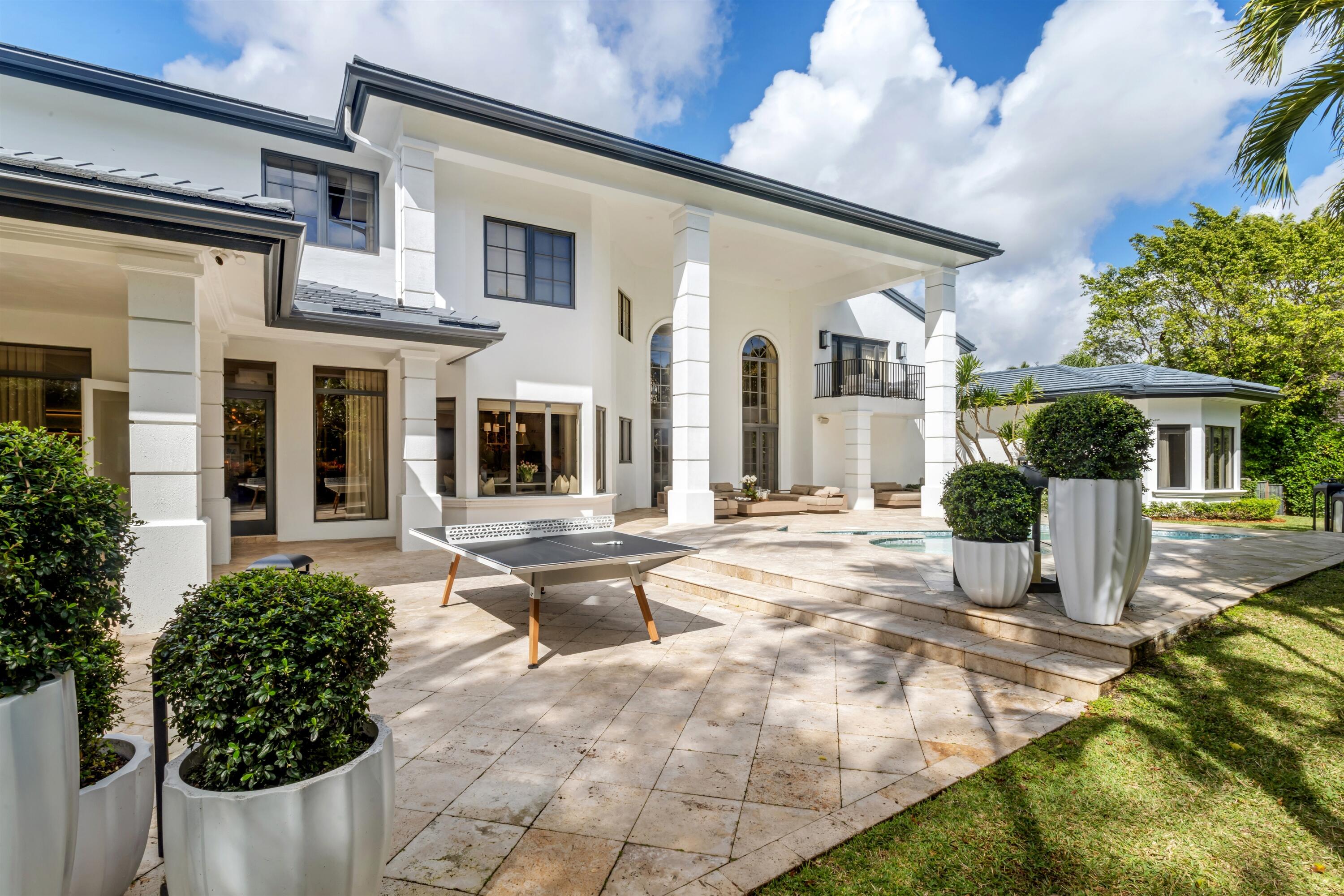 4540 Northwest 24th Avenue Boca Raton, FL 33431 - Photo 30 of 36 a view of a house with backyard and sitting area