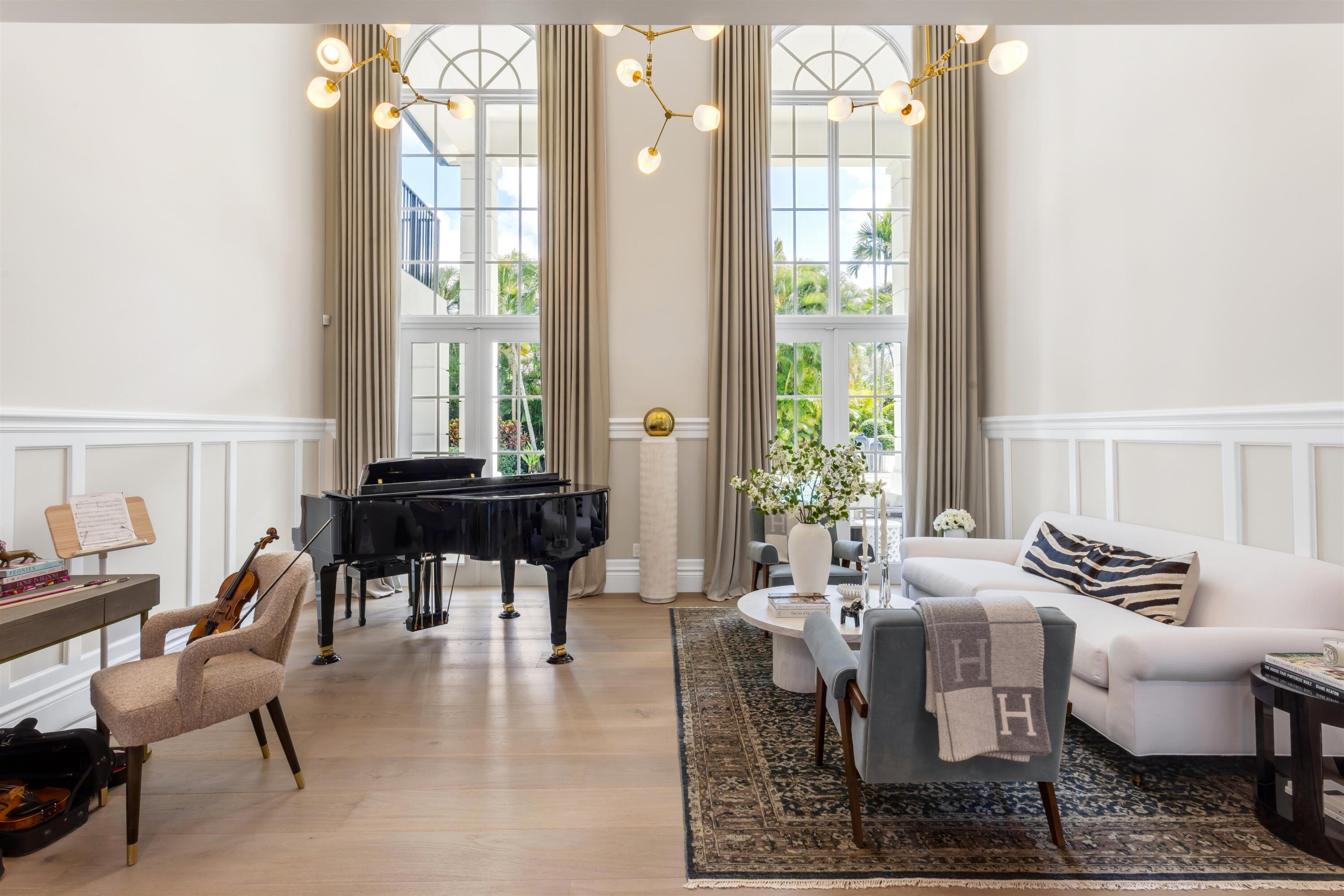 4540 Northwest 24th Avenue Boca Raton, FL 33431 - Photo 3 of 36 a view of a dining room with furniture and a large window