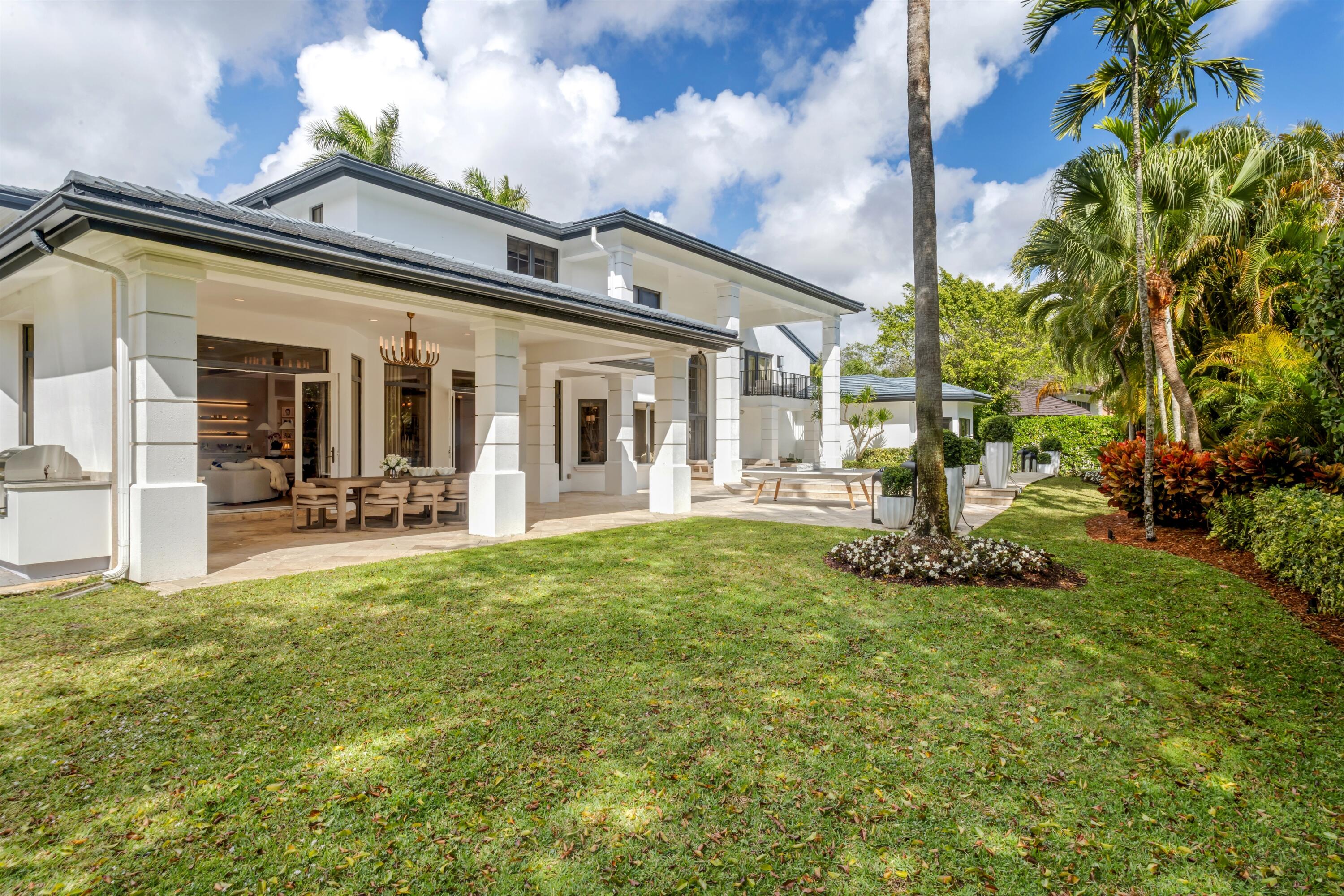 4540 Northwest 24th Avenue Boca Raton, FL 33431 - Photo 31 of 36 a view of a house with a yard