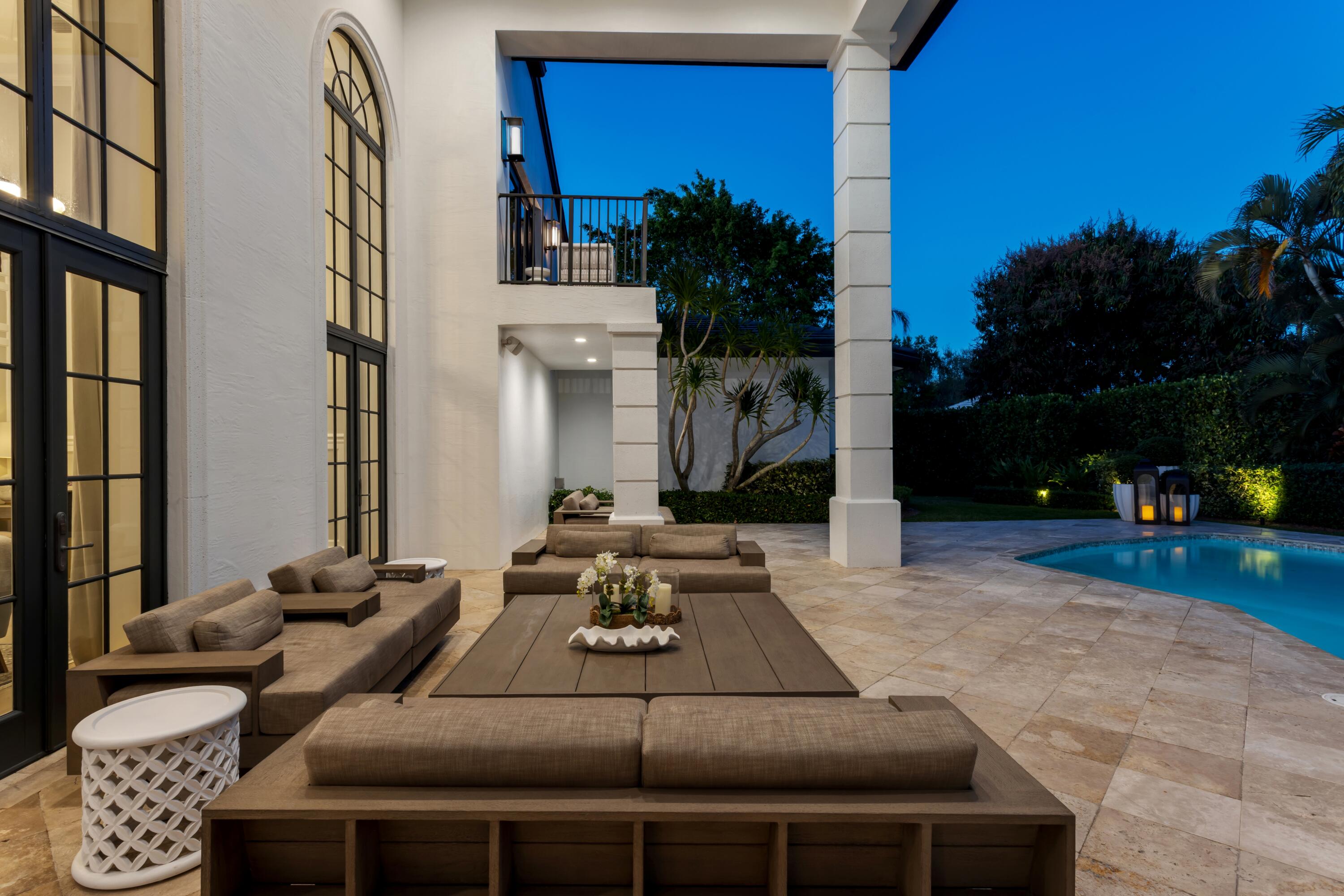 4540 Northwest 24th Avenue Boca Raton, FL 33431 - Photo 33 of 36 a outdoor space with patio couch and a potted plant