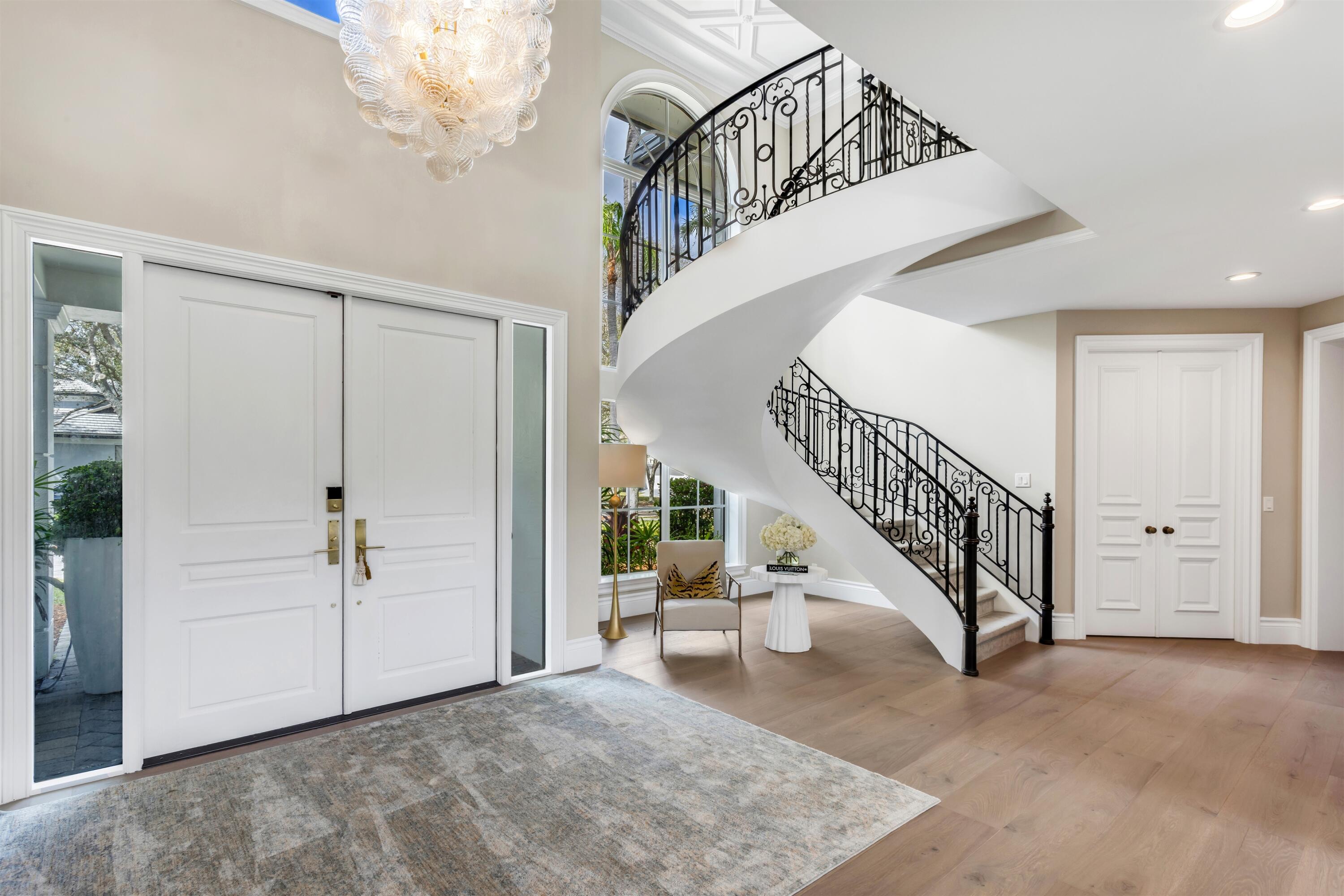 4540 Northwest 24th Avenue Boca Raton, FL 33431 - Photo 6 of 36 a view of a hallway with staircase