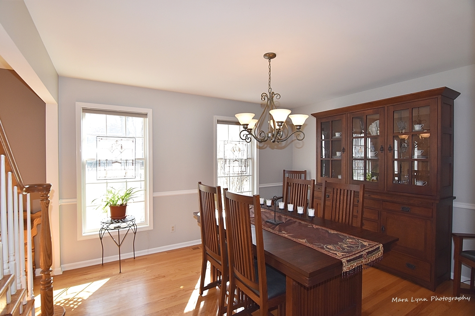 1805 Forest Ridge Road St. Charles, IL 60174 - Photo 8 of 25 a view of a dining room with furniture window and wooden floor