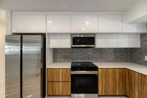 a room with sink and window