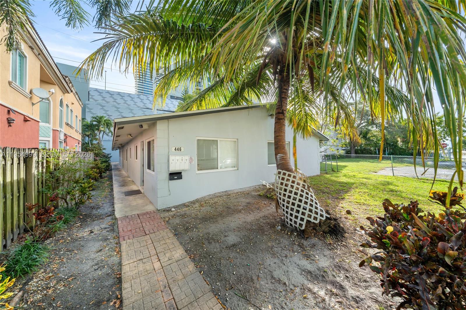446 Southwest 4th Avenue, Unit 3 Fort Lauderdale, FL 33315 - Photo 14 of 15 a front view of a house with garden