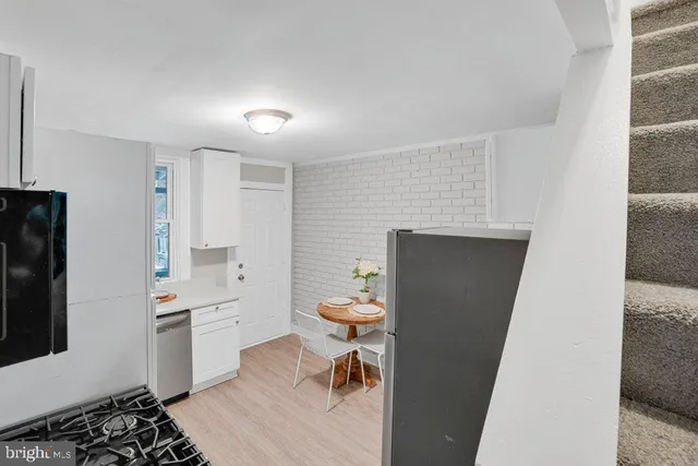 a room with a chair and storage space