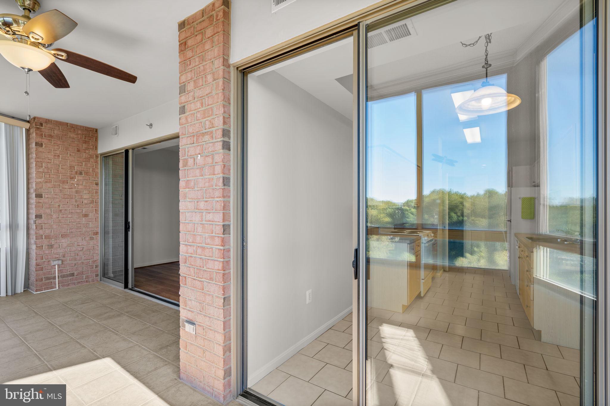 3210 North Leisure World Boulevard, Unit 1001 Silver Spring, MD 20906 - Photo 15 of 47 Sunroom