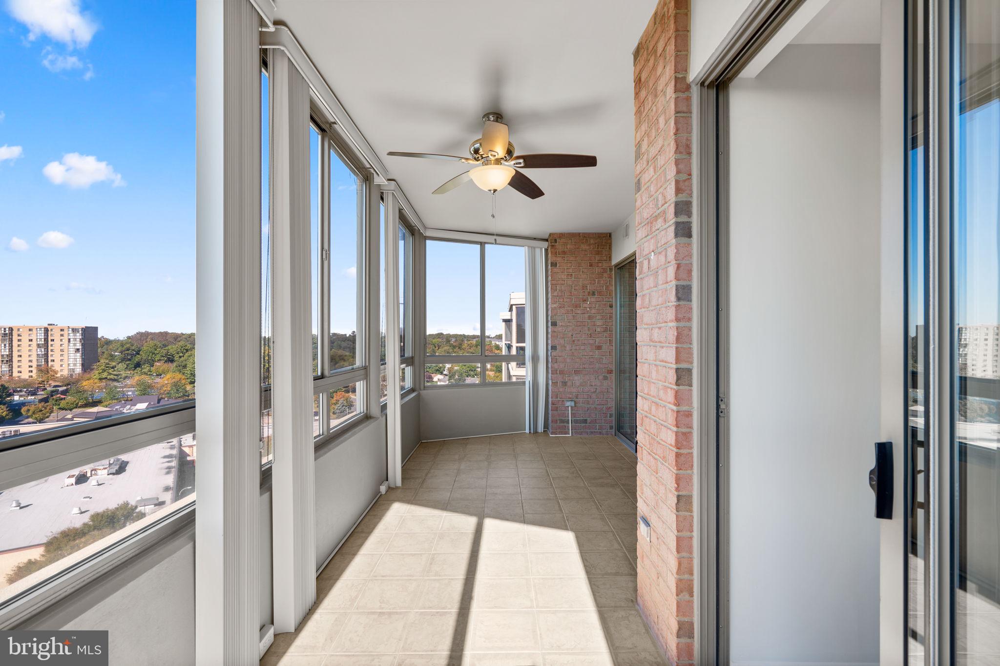 3210 North Leisure World Boulevard, Unit 1001 Silver Spring, MD 20906 - Photo 16 of 47 Sunroom