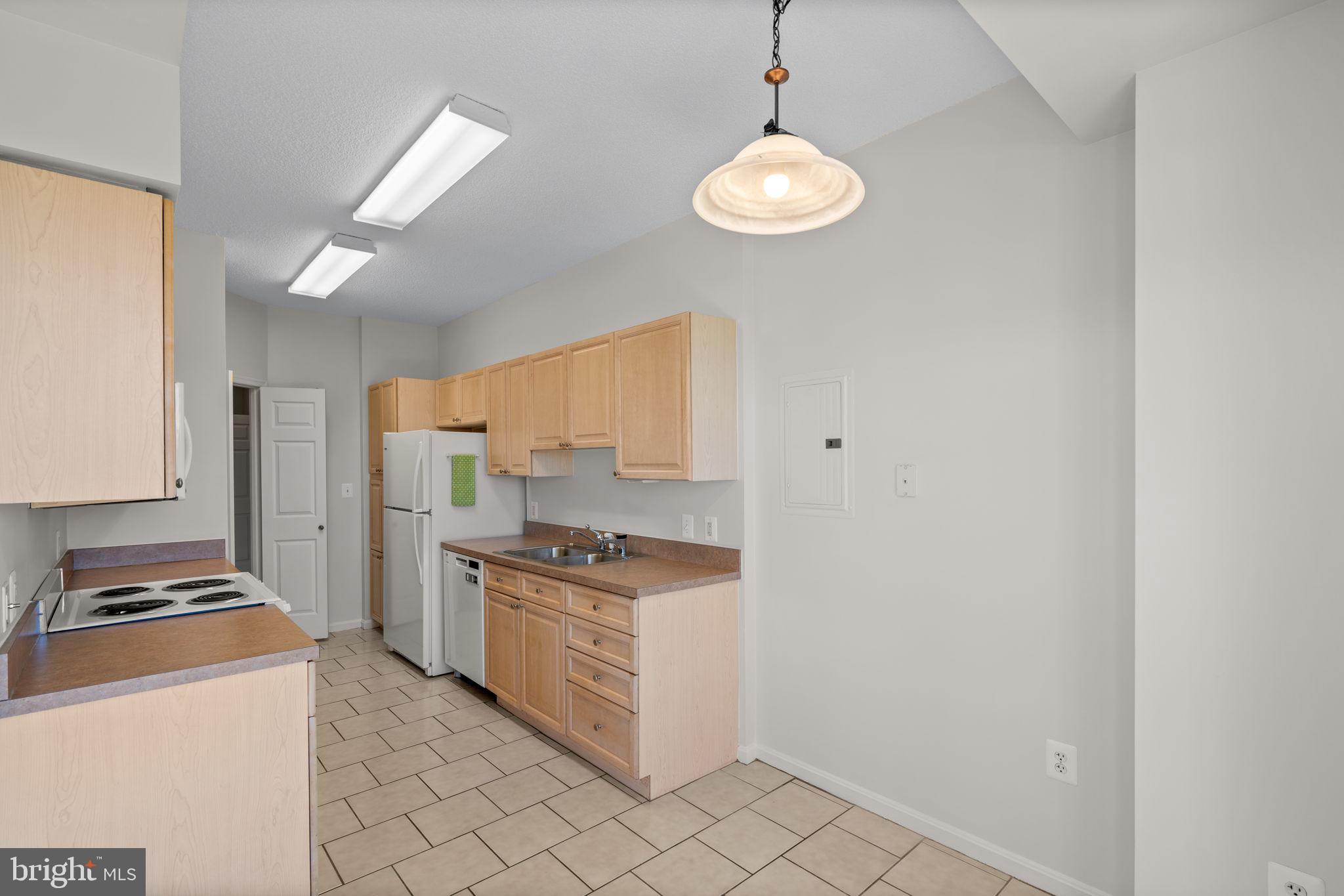 3210 North Leisure World Boulevard, Unit 1001 Silver Spring, MD 20906 - Photo 21 of 47 Eat-in Kitchen