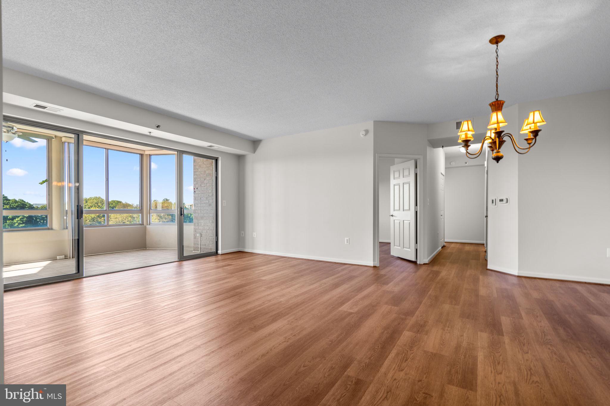 3210 North Leisure World Boulevard, Unit 1001 Silver Spring, MD 20906 - Photo 8 of 47 Livingroom to Sunroom
