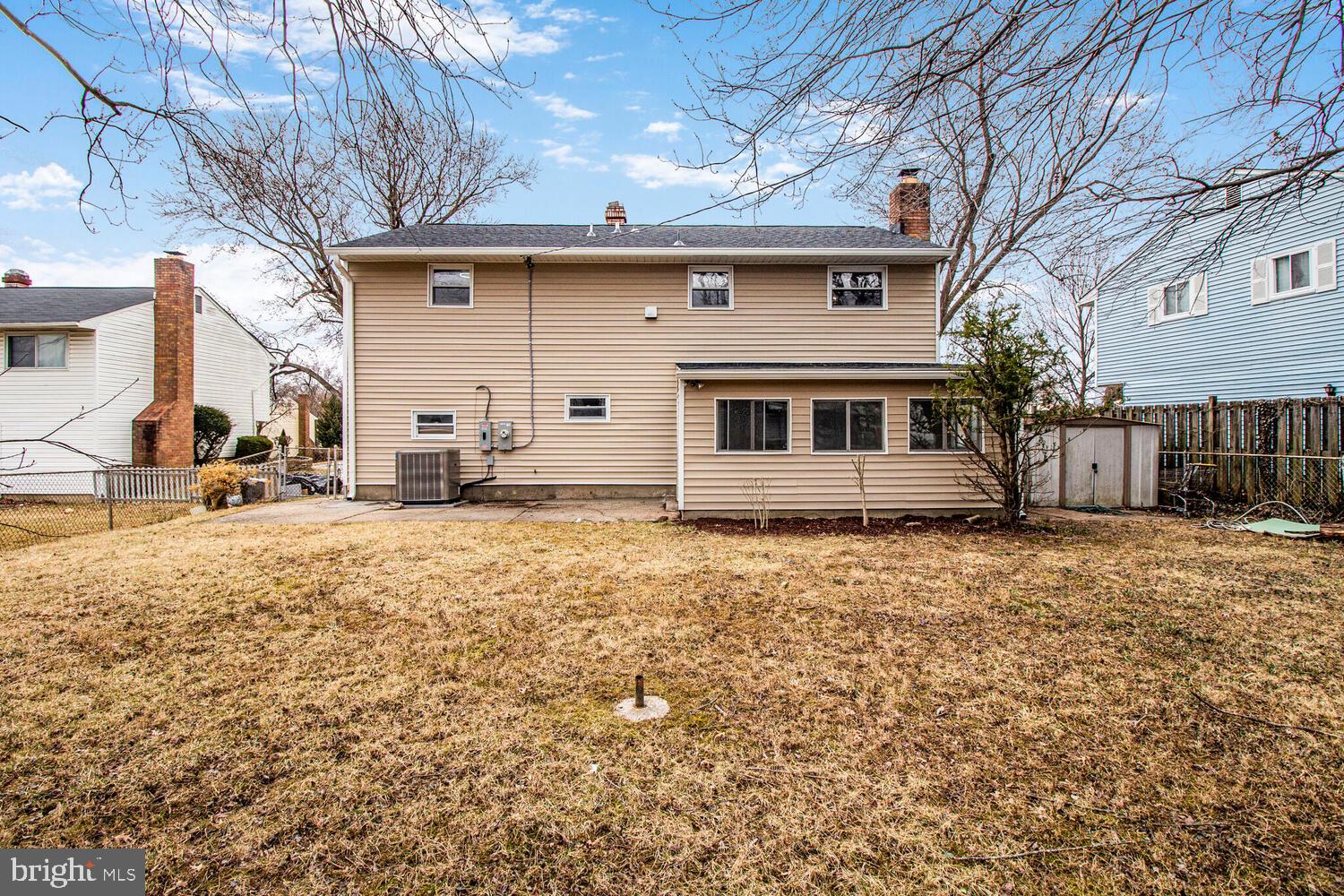 8808 Sigrid Road Randallstown, MD 21133 - Photo 16 of 20 a front view of a house with a yard