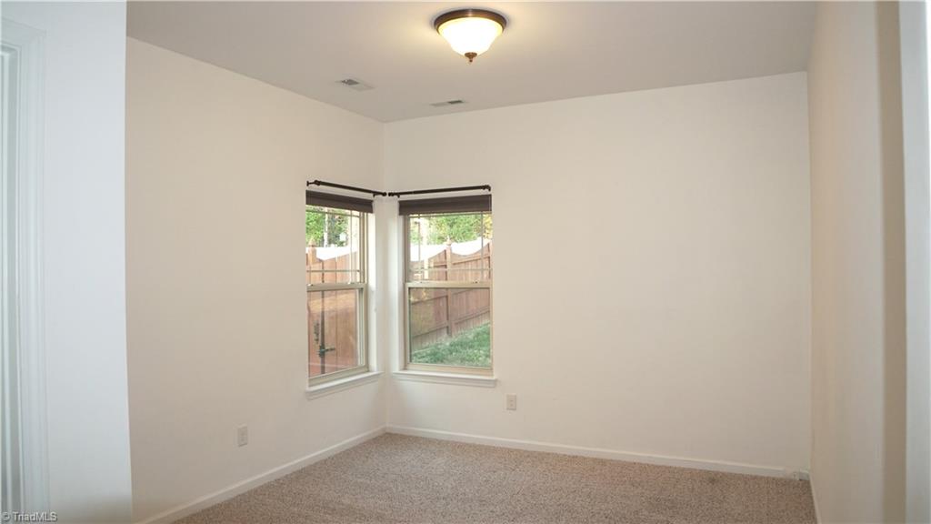 4626 White Beard Road High Point, NC 27265 - Photo 15 of 23 First Floor Bedroom with private access to full bath