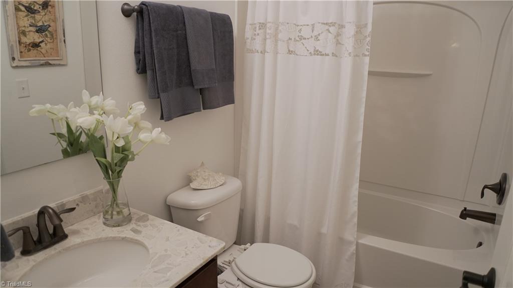 4626 White Beard Road High Point, NC 27265 - Photo 17 of 23 First floor full bath with access as private bath and family room