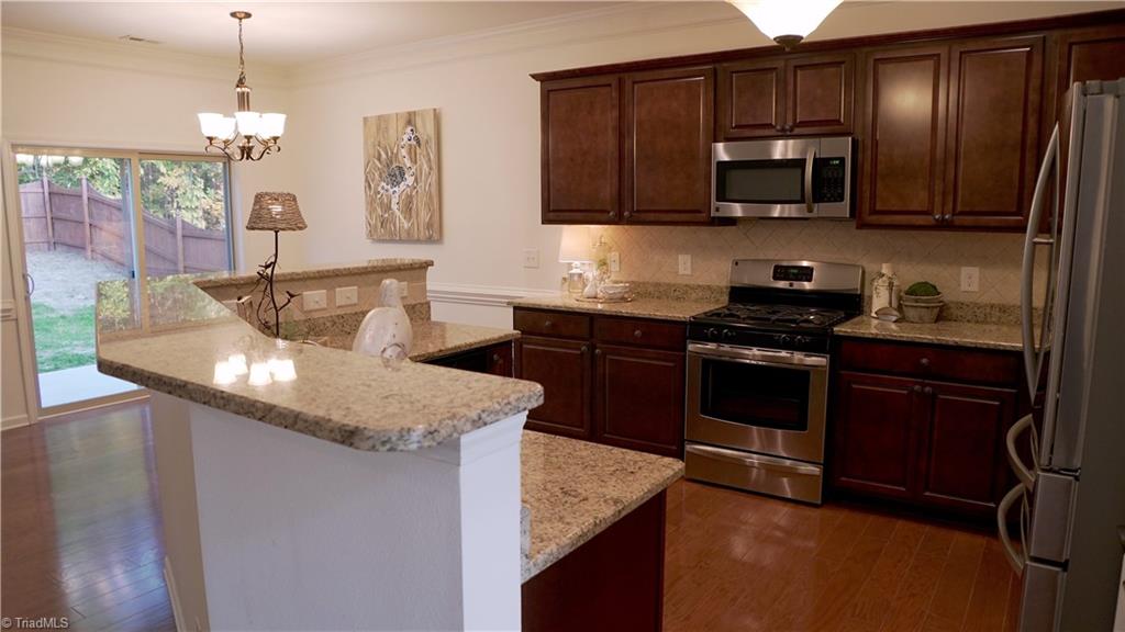 4626 White Beard Road High Point, NC 27265 - Photo 4 of 23 Sunny kitchen with Stainless Appliances