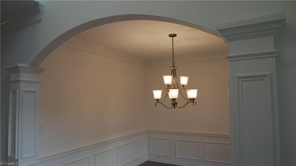 4626 White Beard Road High Point, NC 27265 - Photo 7 of 23 Arched opening leads to sun filled Dining Room