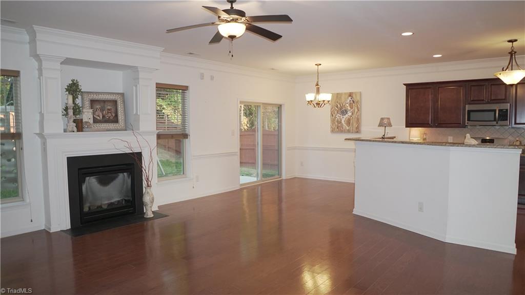 4626 White Beard Road High Point, NC 27265 - Photo 8 of 23 Living Room with double moldings opens to kitchen.