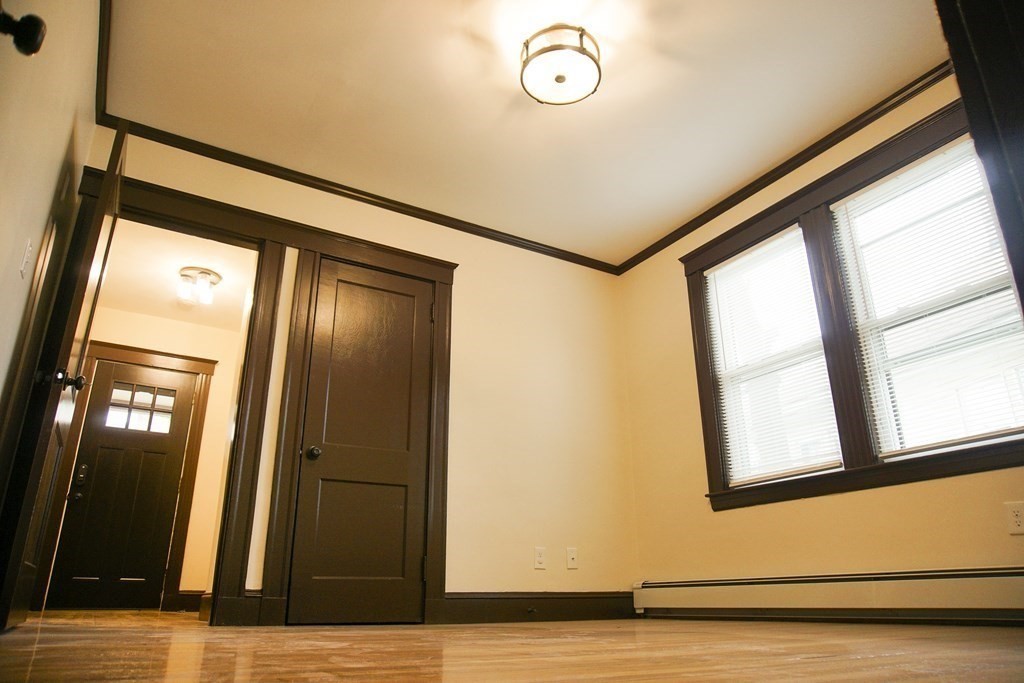 16 Ogden Street, Unit 16 Boston, MA 02124 - Photo 4 of 9 a view of an entryway