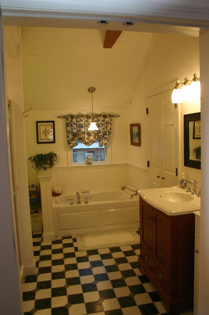 124 County Road Huntington, MA 01050 - Photo 11 of 17 a bathroom with a sink a toilet and mirror