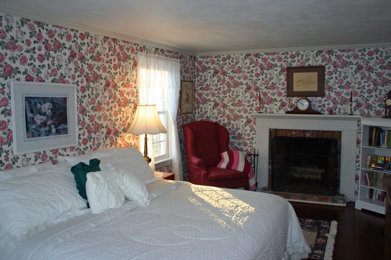 124 County Road Huntington, MA 01050 - Photo 13 of 17 a bedroom with a bed and a fireplace