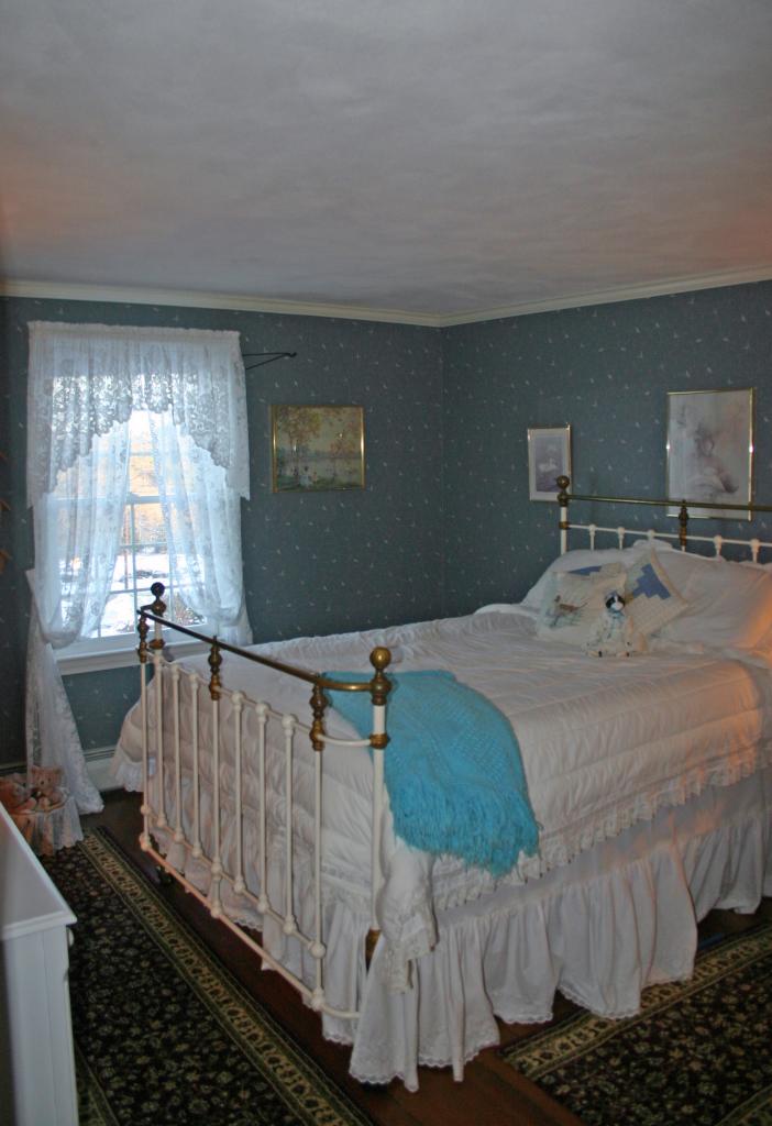 124 County Road Huntington, MA 01050 - Photo 15 of 17 a bedroom with a bed and window