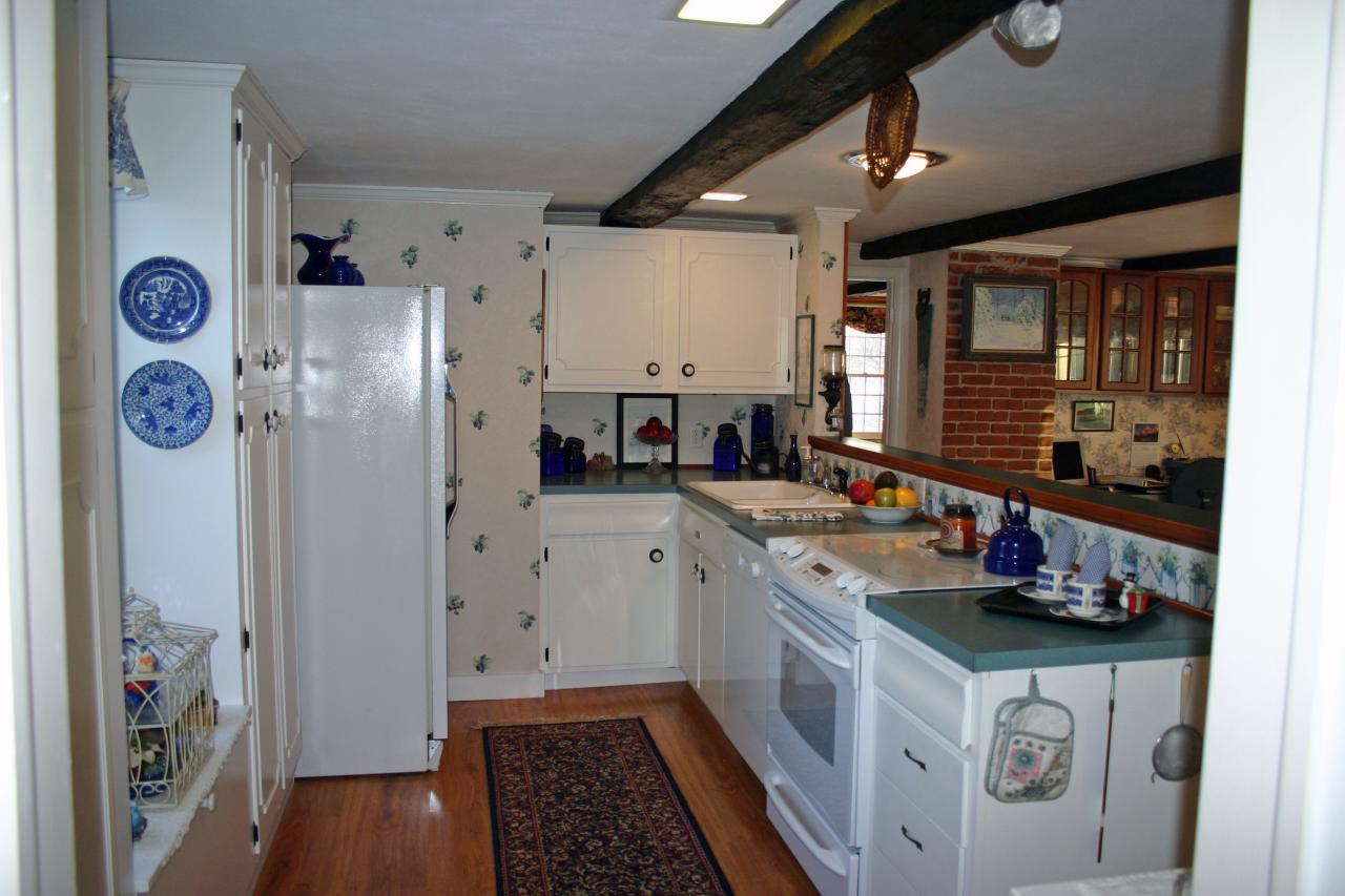124 County Road Huntington, MA 01050 - Photo 6 of 17 a kitchen with stainless steel appliances granite countertop a refrigerator and a stove