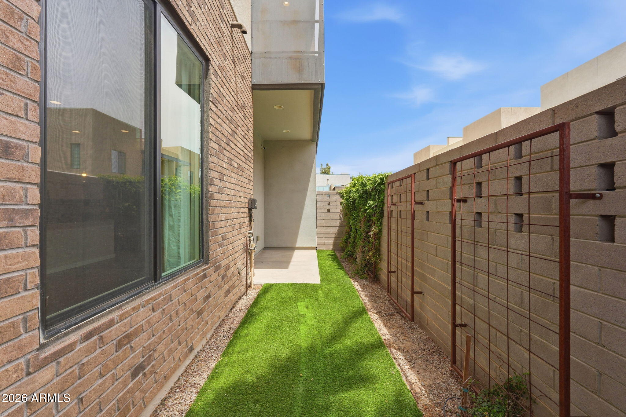 901 South Smith Road, Unit 1038 Tempe, AZ 85281 - Photo 29 of 29 a view of a backyard with pathway