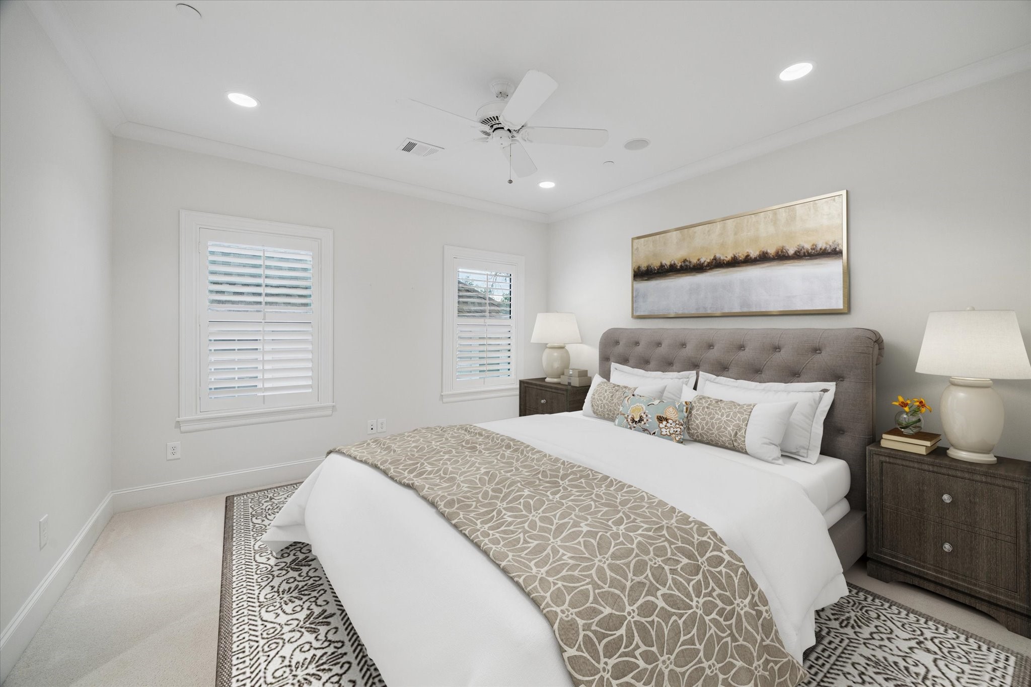 4511 Merrie Lane Bellaire, TX 77401 - Photo 34 of 46 a spacious bedroom with a large bed and a chandelier
