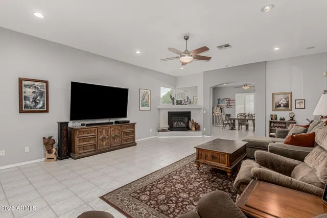 a living room with furniture and a window