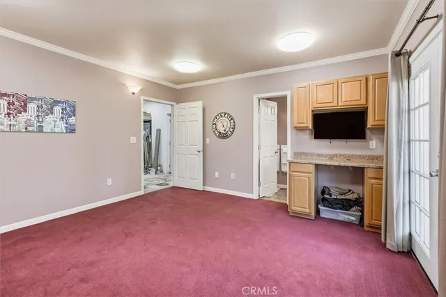 a front view of house with outdoor seating