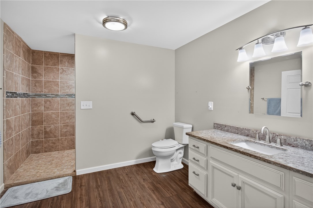 136 Loran Pointe Circle Seneca, SC 29672 - Photo 37 of 50 A compact and functional bathroom showcasing a tiled walk-in shower and modern vanity.