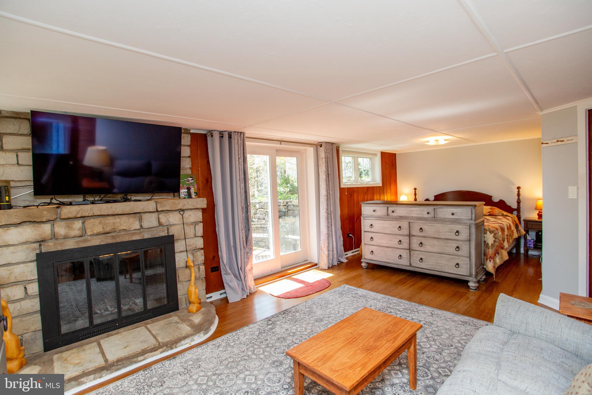 6682 Upper York Road New Hope, PA 18938 - Photo 40 of 56 Wood burning fireplace in the in-law suite