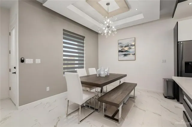 a view of a workspace with furniture