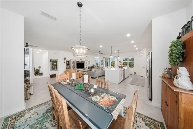 a bedroom with a large bed and a furniture