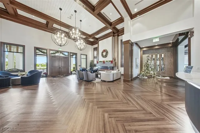 a view of a room with lots of table and chairs