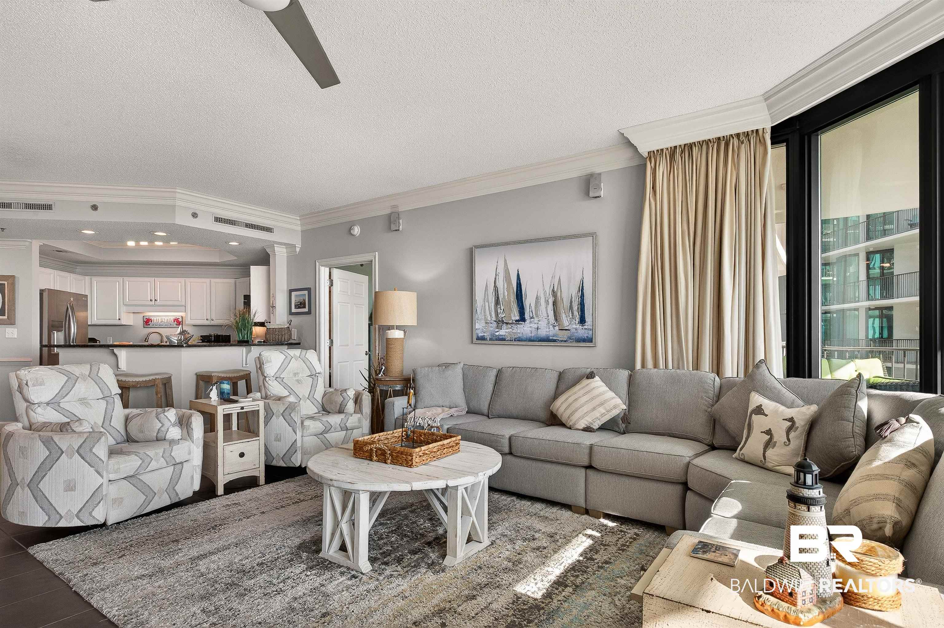 27582 Canal Road, Unit 2507 Orange Beach, AL 36561 - Photo 14 of 75 Living area featuring ornamental molding, ceiling fan, and a textured ceiling