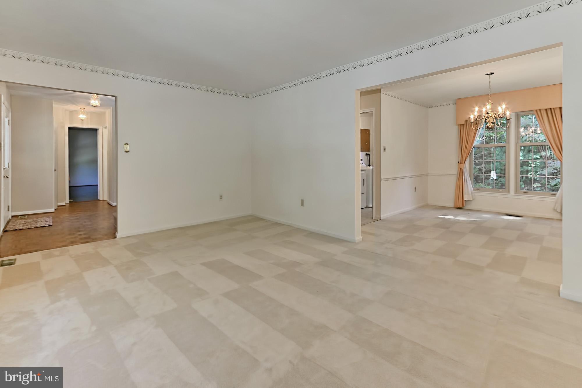 9849 Natick Road Burke, VA 22015 - Photo 12 of 29 Living room off the foyer with plush carpet