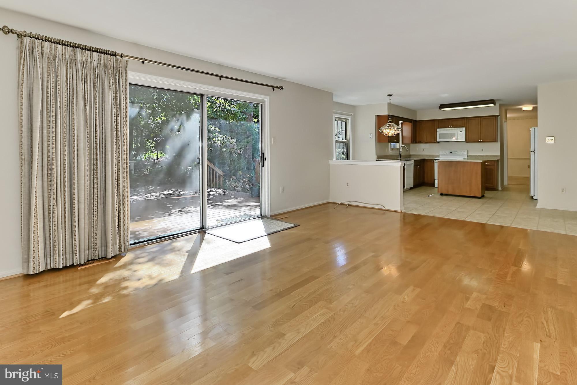 Family Rm off the kit w/ large sliding glass doors