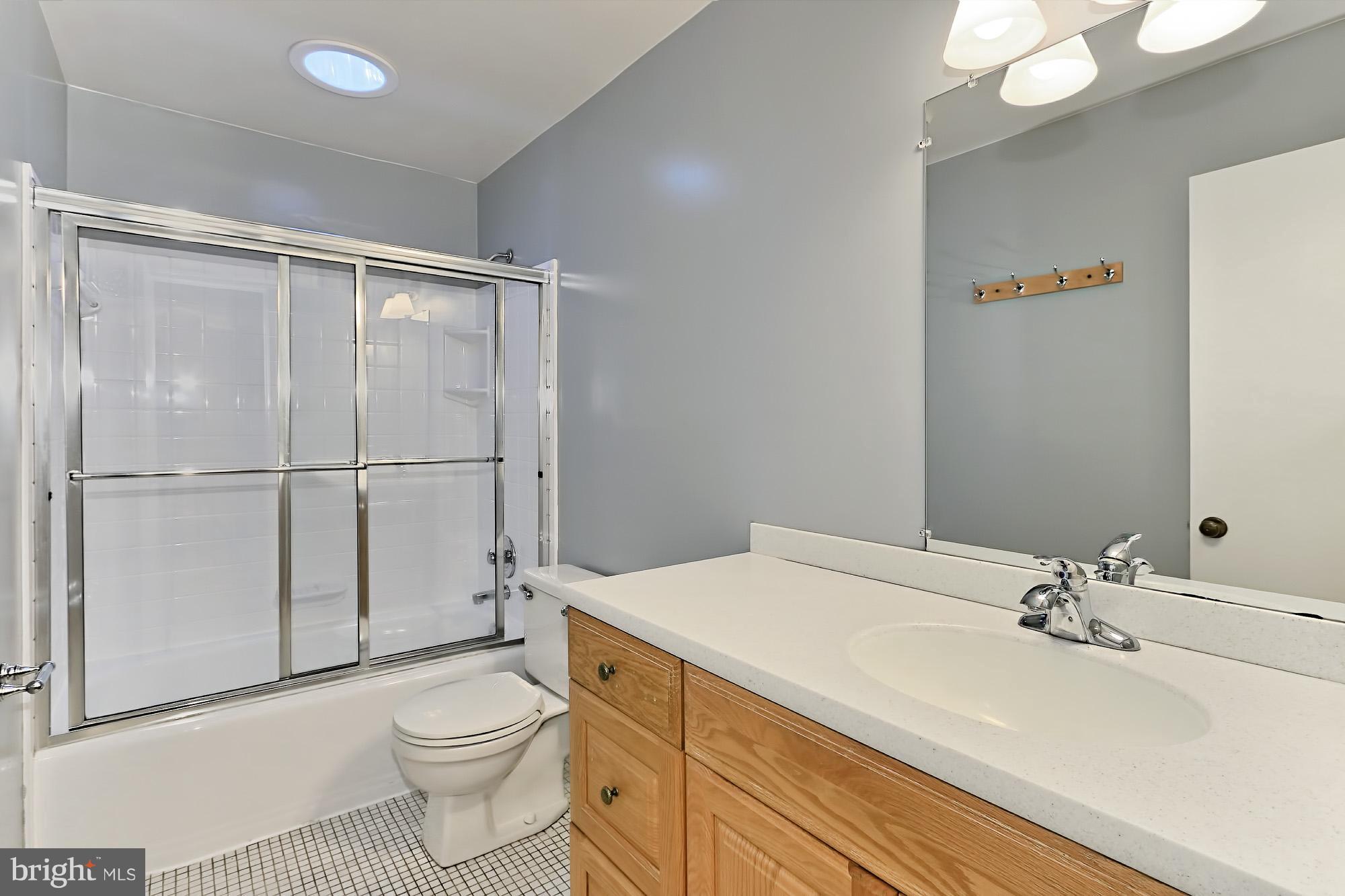 9849 Natick Road Burke, VA 22015 - Photo 22 of 29 Second upper level full bath with solar tube